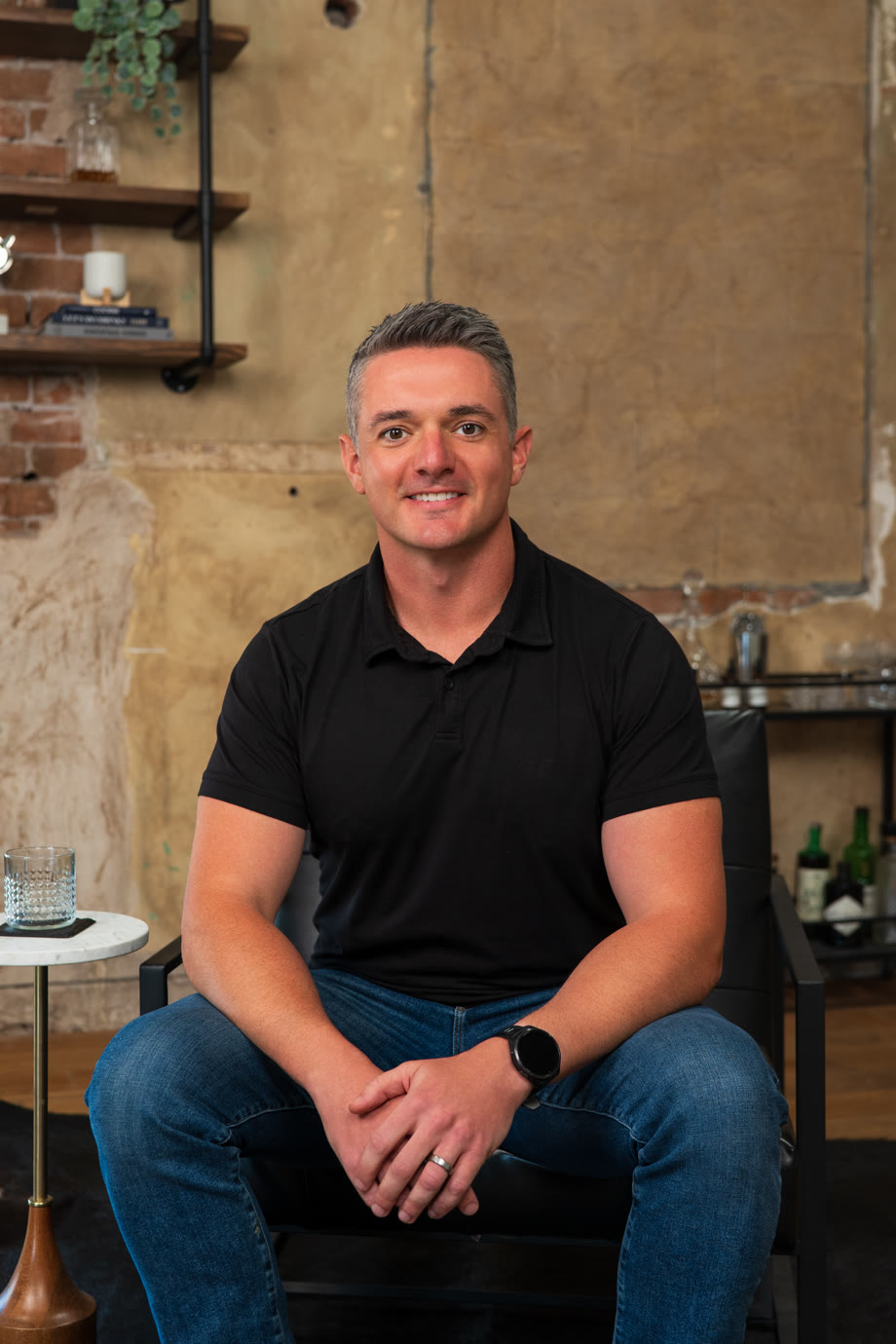 Nathan Donohue, founder and CEO of Valence Wealth, seated in his Scottsdale office